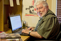 William Cobb-Writing in his office